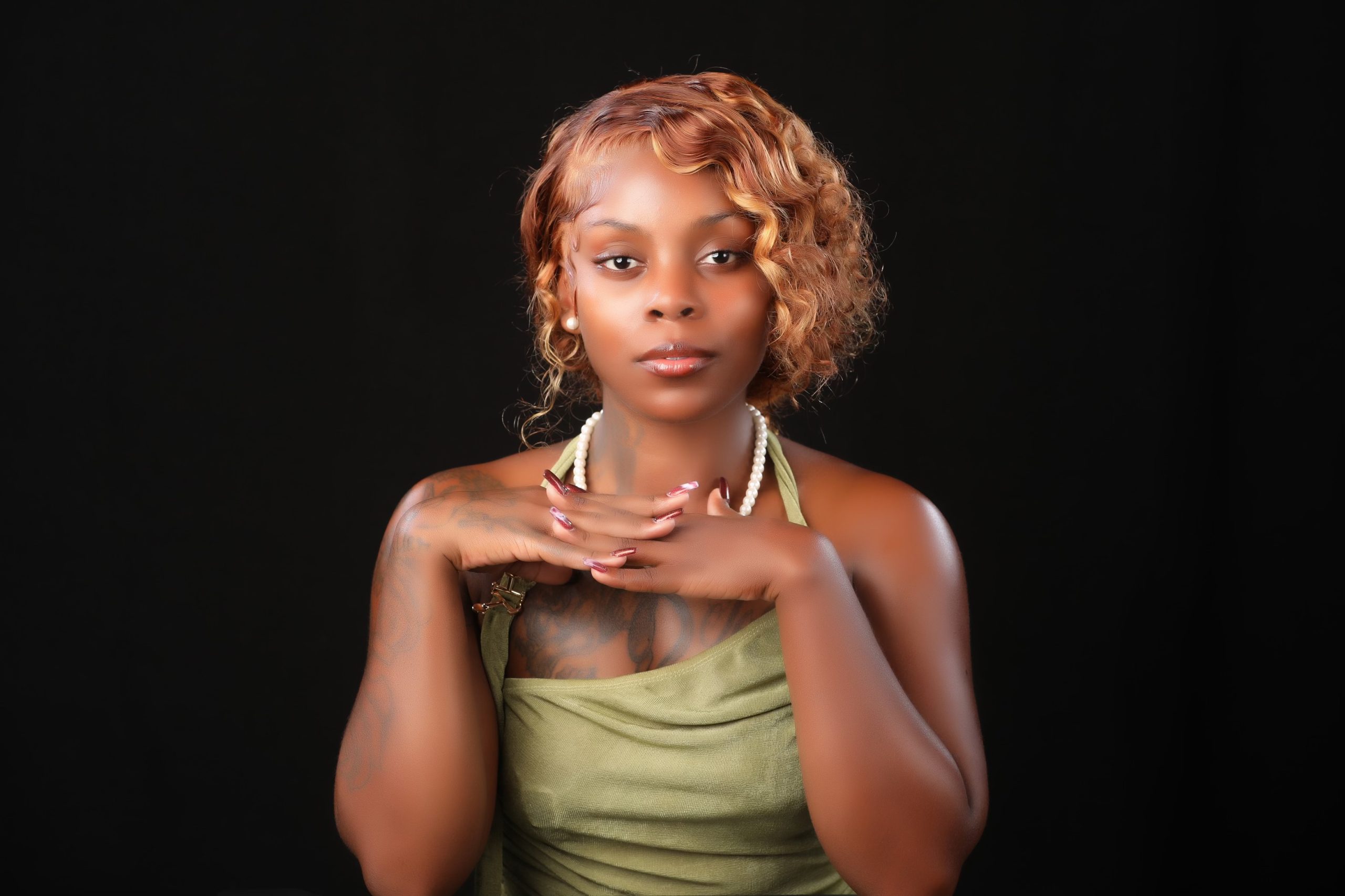 The Raw Truth: Meet Ikeyva Savage, The Artist Breaking Free From People-Pleasing