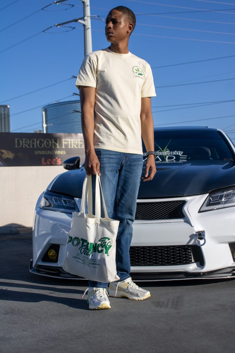 celebrity recording artist Young Keefa doing a photoshoot with his sponsor